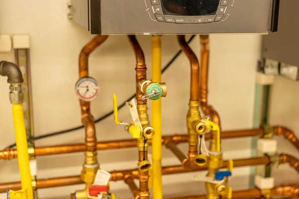 Licensed technician providing Backflow Prevention for a homeowner in Camp Swift